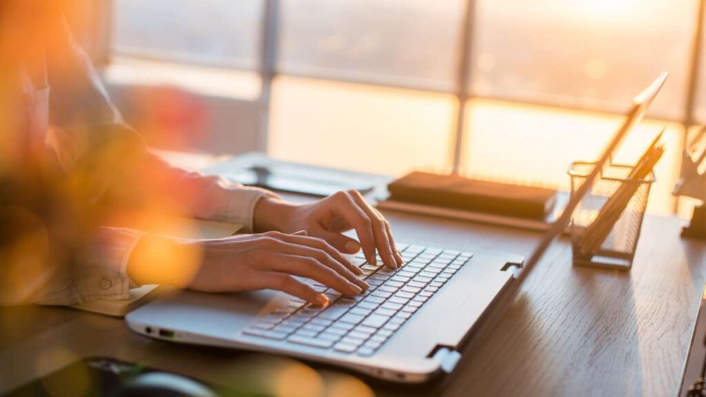 Person Working On Laptop